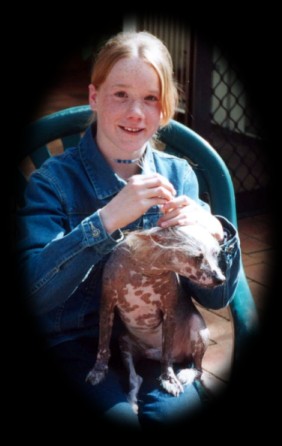 My dear friend Spike (a hairless Chinese Crested Dog, aged 10 years) and my sister Claire.